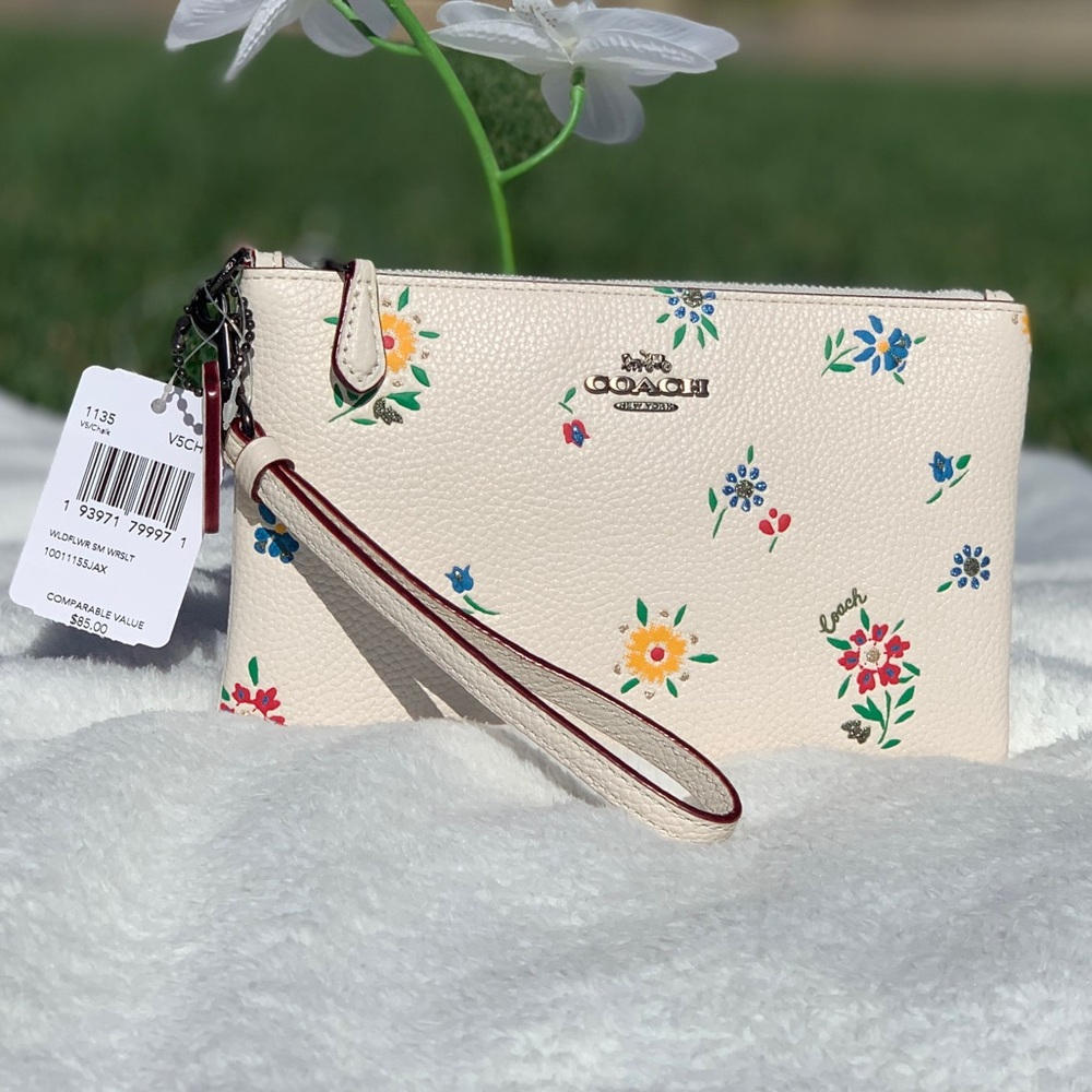 Coach Wristlet with wildflower print